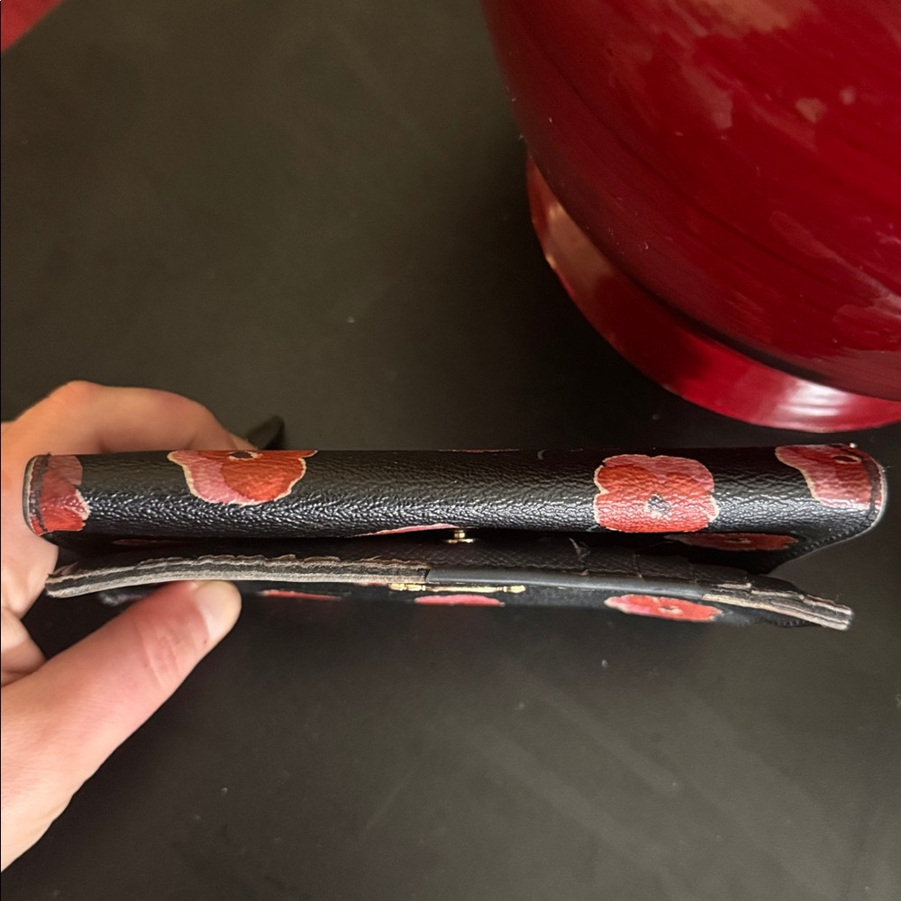 COACH bifold wallet with cute poppy print. Change pocket in back. Snap closure. - Picture 8 of 16
